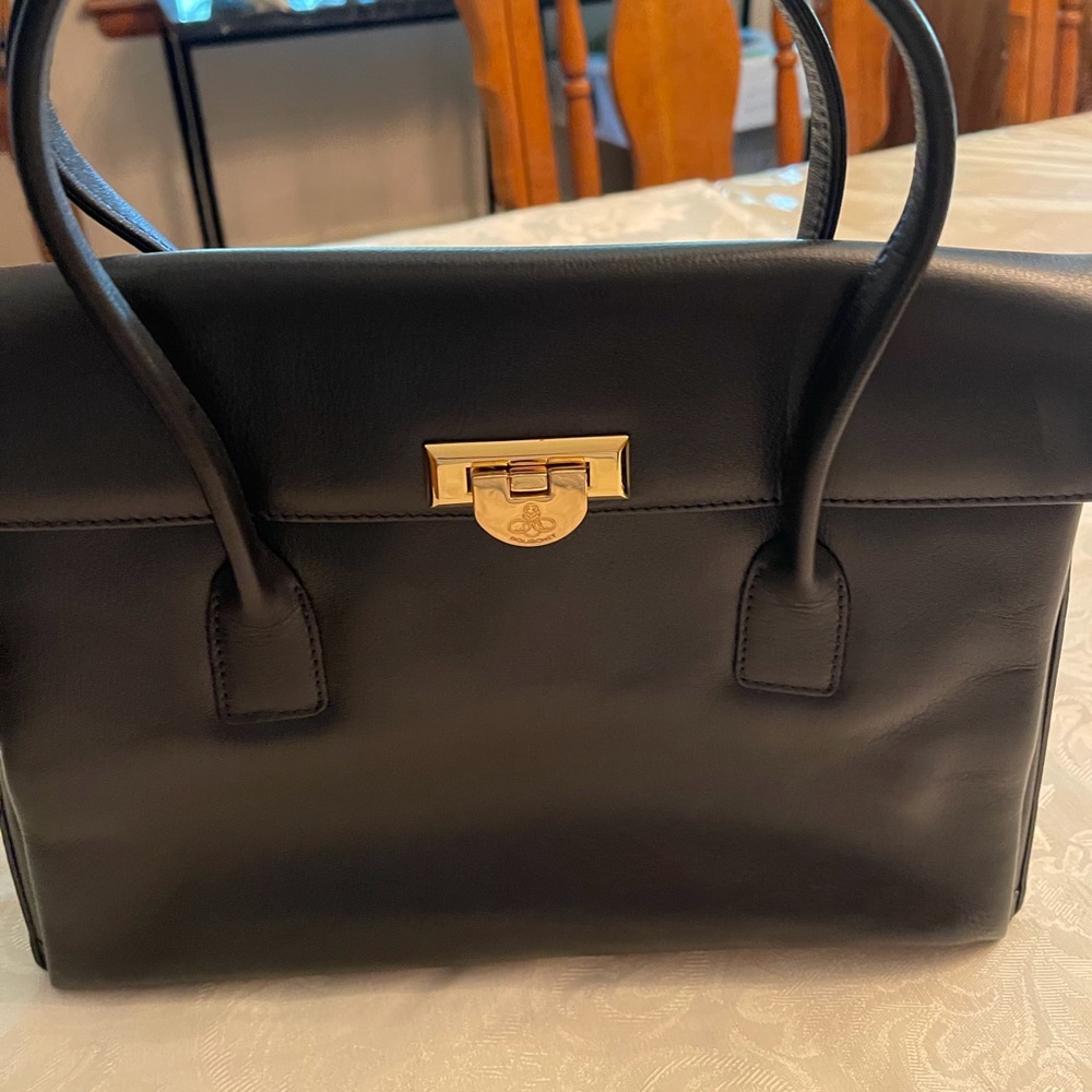 Pourchet in black, very good condition.